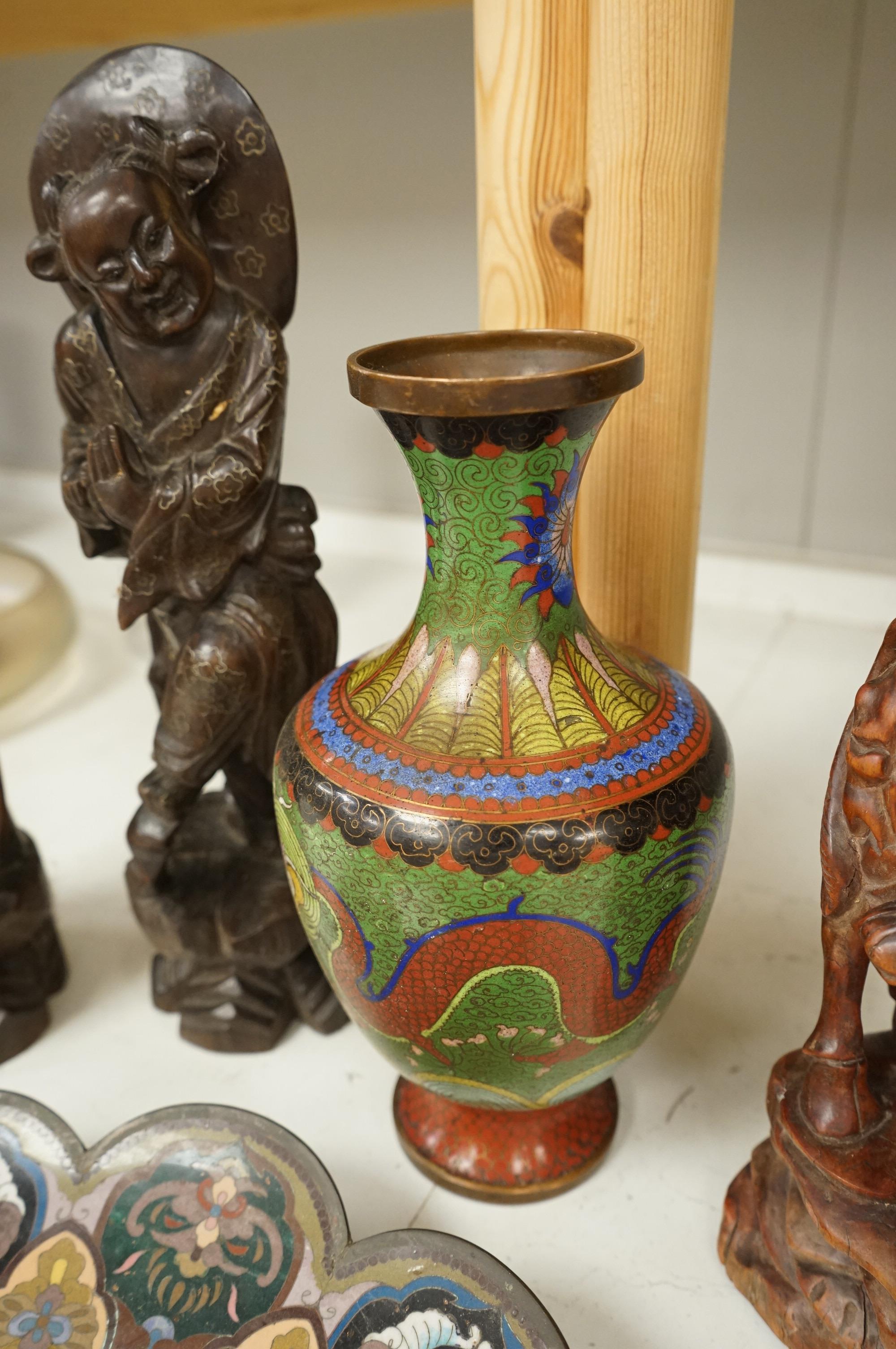 A Japanese cloisonné enamel dish, a Chinese cloisonné enamel vase and three Chinese carved wood figures, largest 39cm high